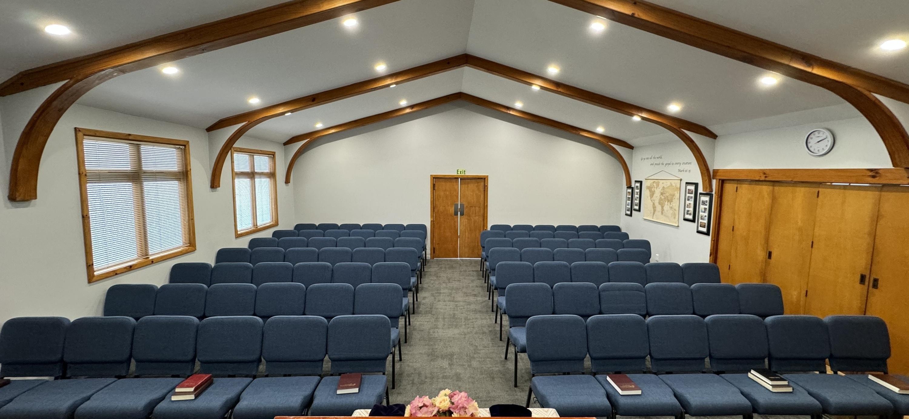 The auditorium looking back towards the doors, with its timber arches